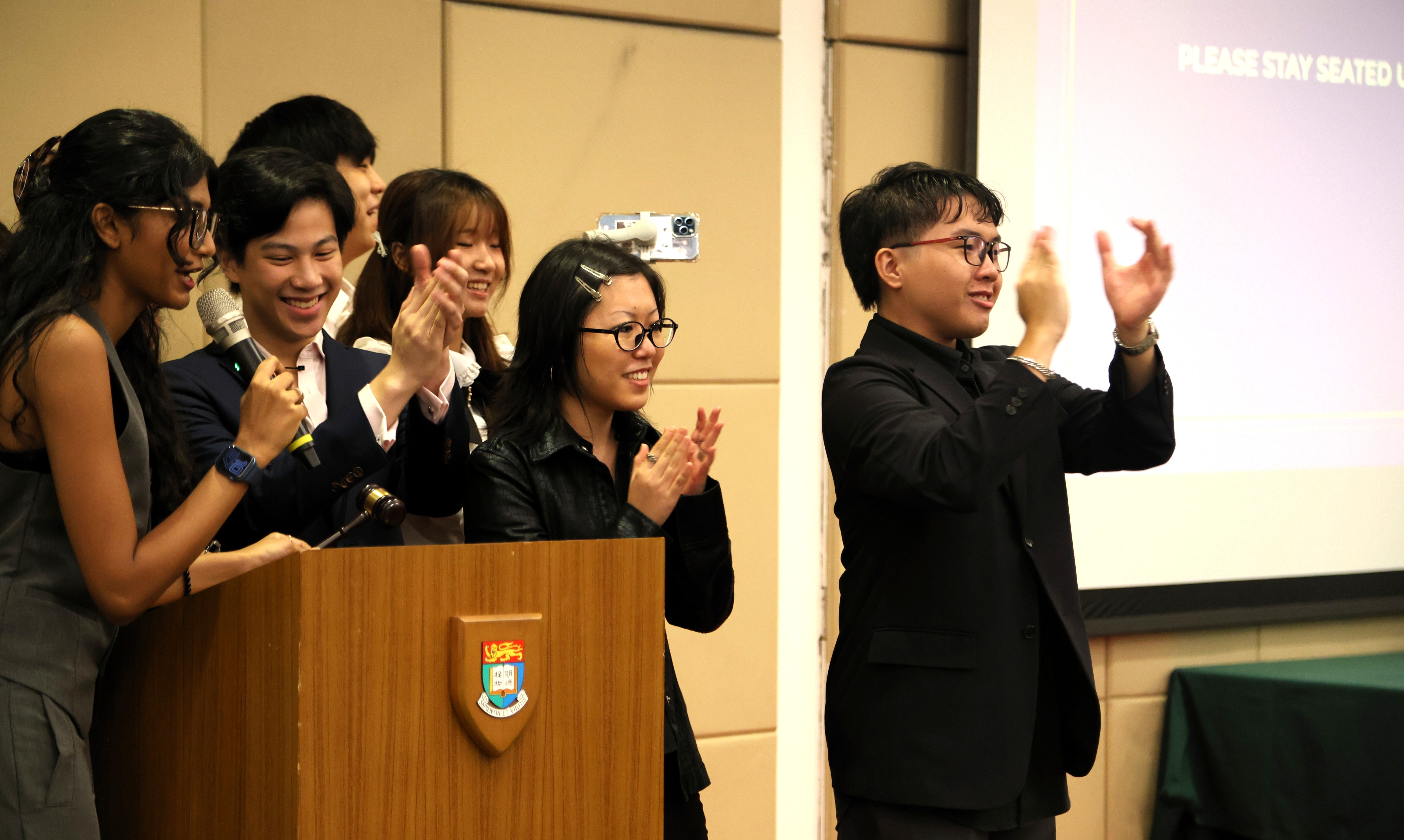 Delegates debating during an ICEMUN Model United Nations council session